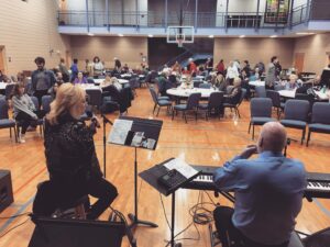 An open door meal with music in the Christian Life Center